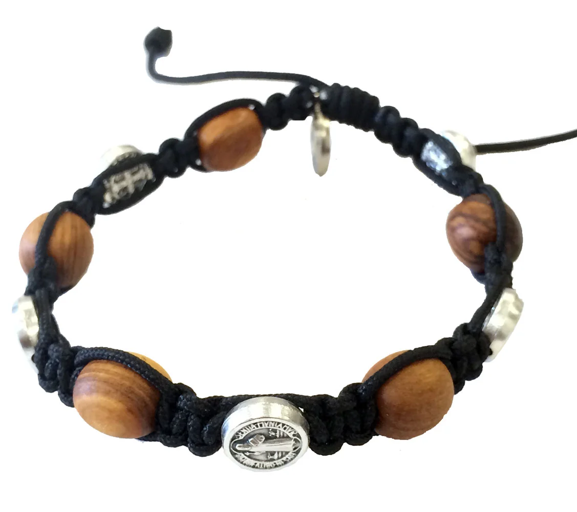 Saint Benedict bracelet. Metal, wood and cord. Cord closure.