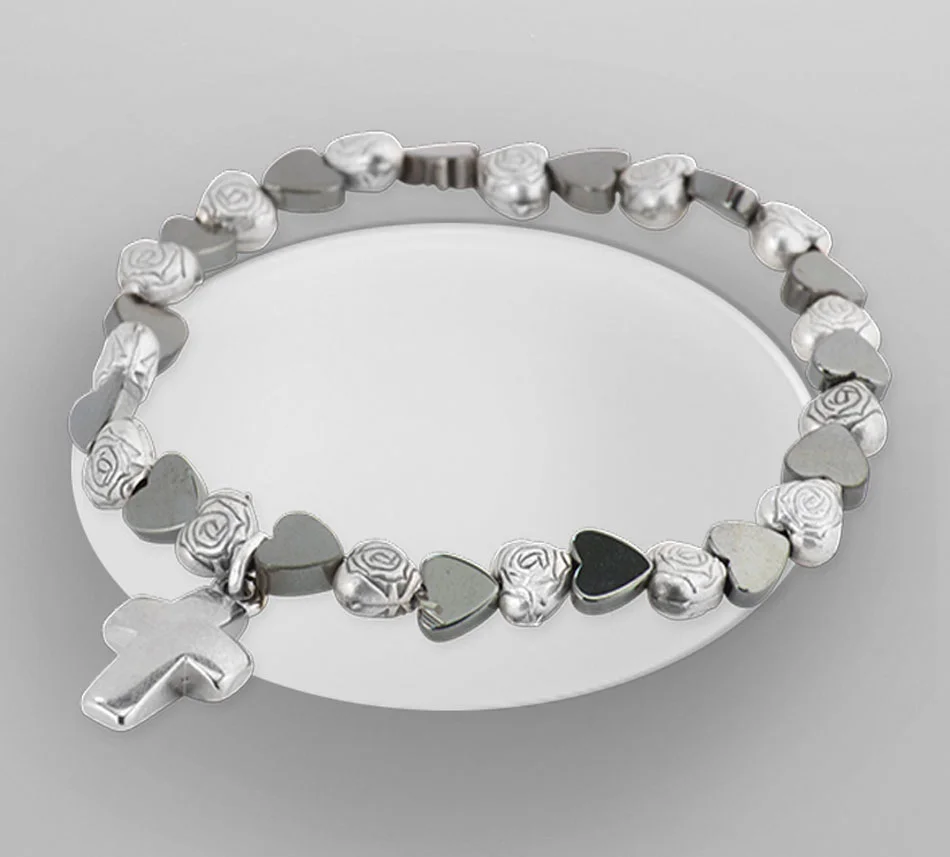 Bracelet with cross, crystal hematite and metal. Elastic
