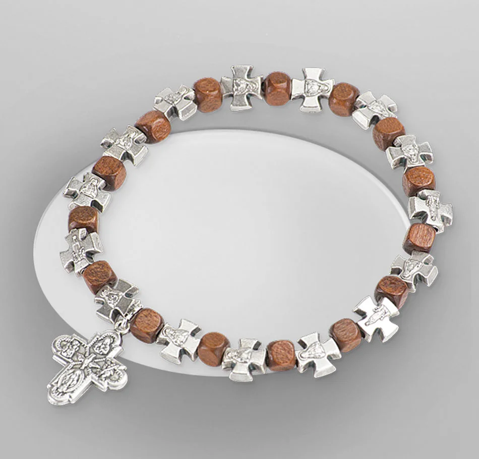Wooden bracelet with crosses. Elastic.