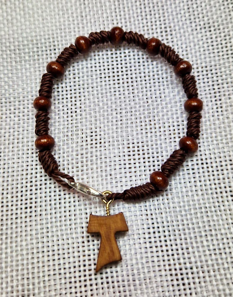 Wooden Decenario . Tau cross